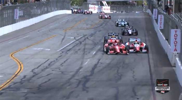 Scott Dixon x Justin Wilson na curva 8